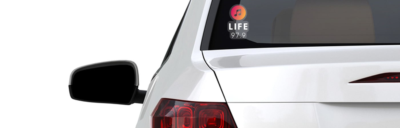 Back of the car with Life 97.9 sticker